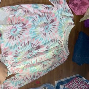 A long sleeve shirt, brand is SO , tie dye